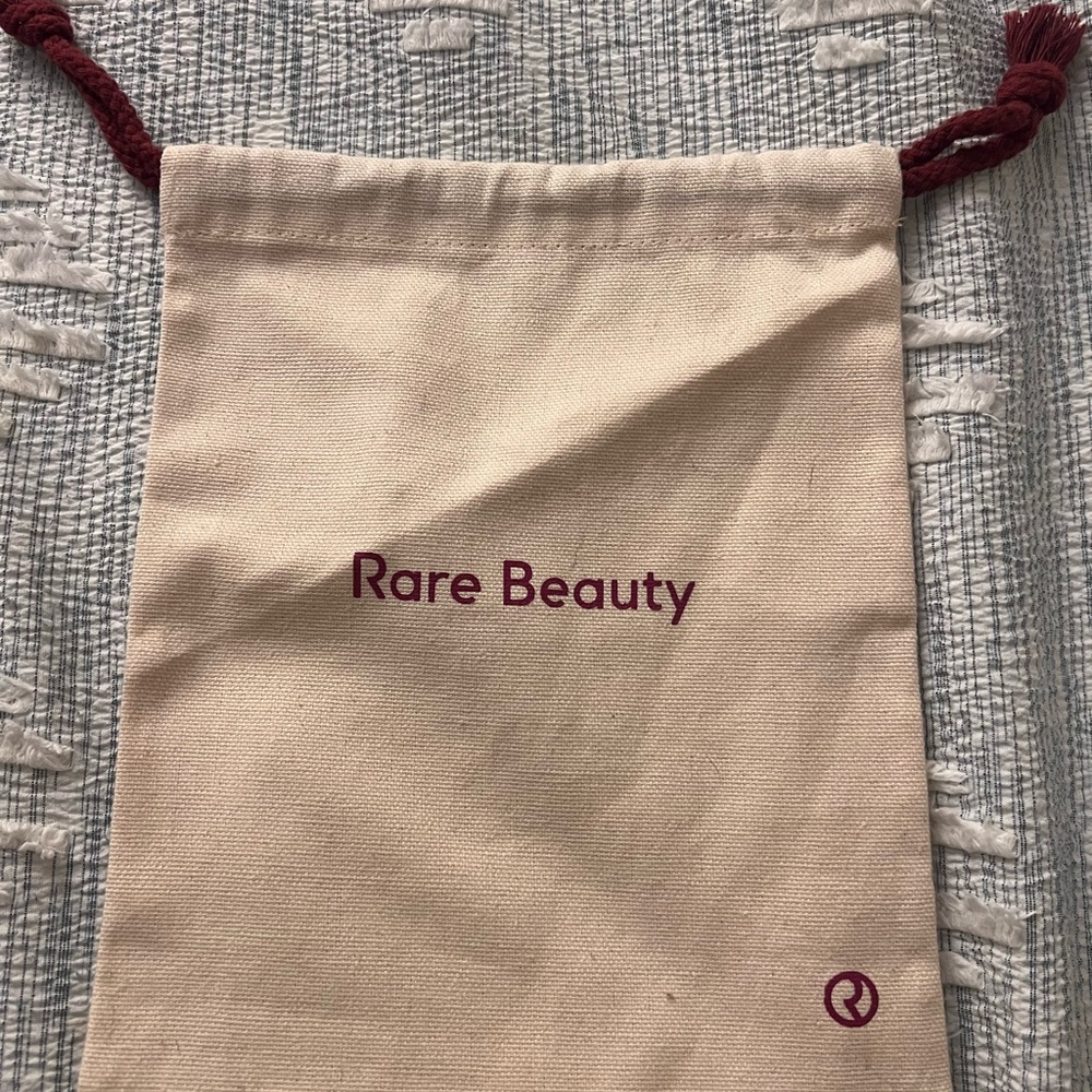 Rare Beauty Beige Pouch with Burgundy Accents